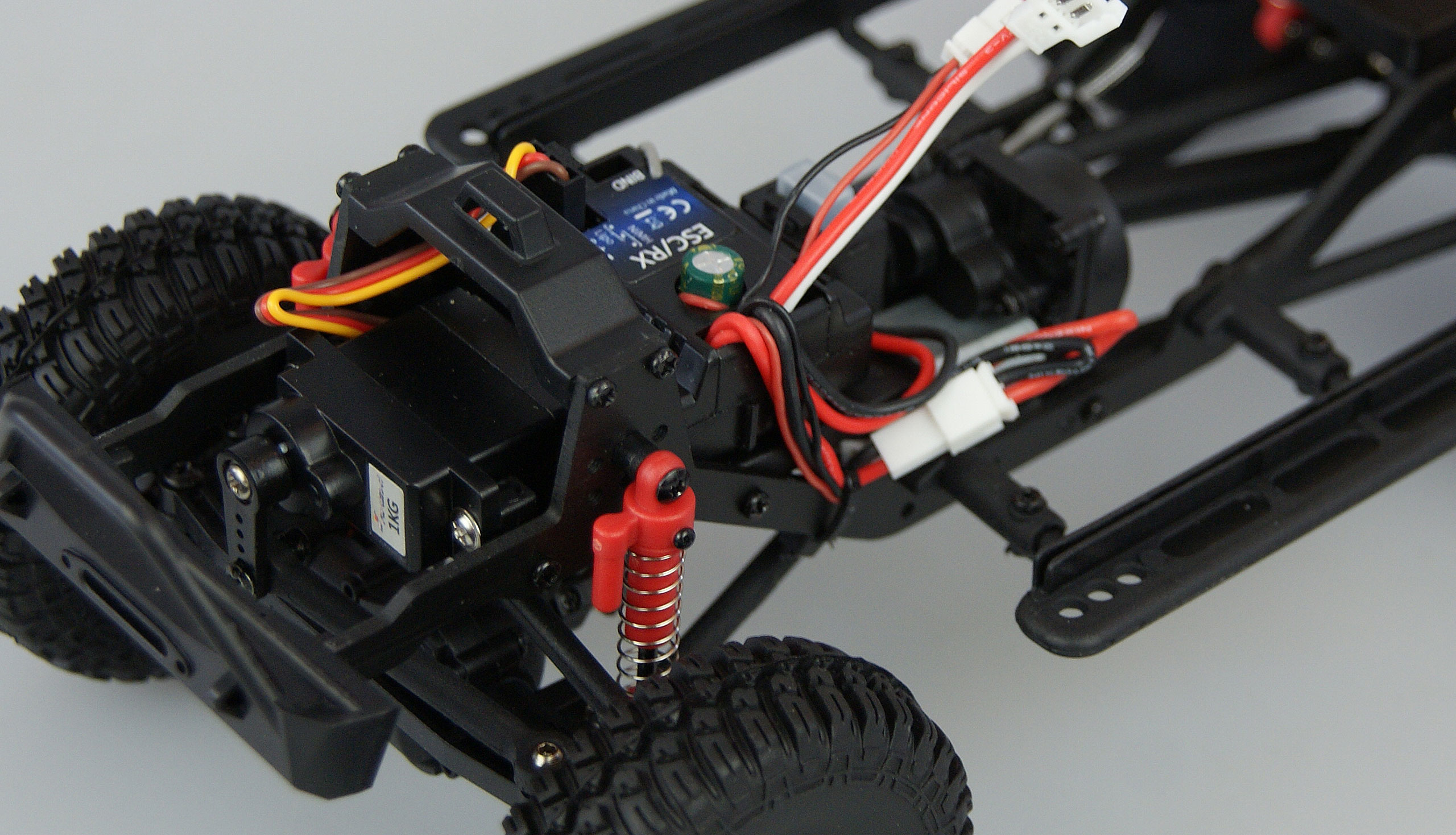Amewi Dirt Climbing SUV Safari Crawler 4WD 1:10 RTR con batteria, telecomando, cavo di ricarica, giallo